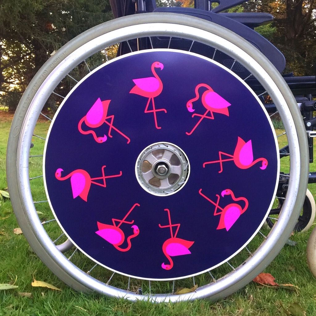 Wheelchair spokeguard custom made to order in a flamingo design. Match with your wheelchair cosy.