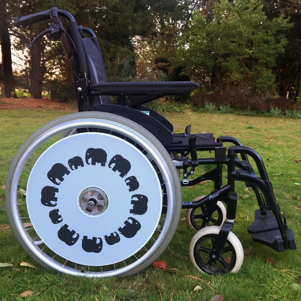 Wheelchair spokeguard custom made to order in an elephant design. Match with your wheelchair cosy.