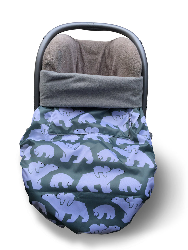 The BundleBean GO is a waterproof footmuff for babies and toddlers that fits snugly on to buggies, bike seats, car seats and baby carriers. Seen here on a car seat and in a polar bear design.