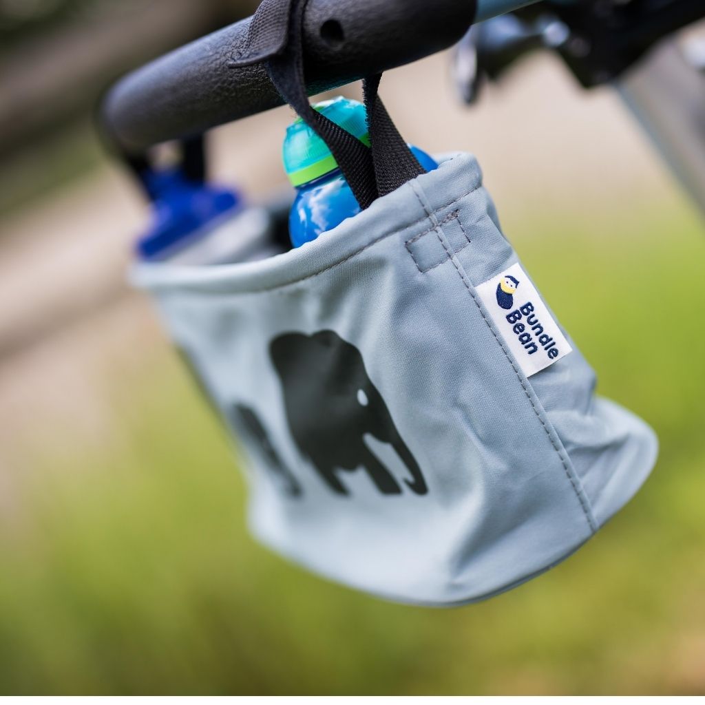 These handy wheelchair organiser bags fit on all wheelchairs, powerchairs, special needs buggies and rollators. Seen here in an elephant design.