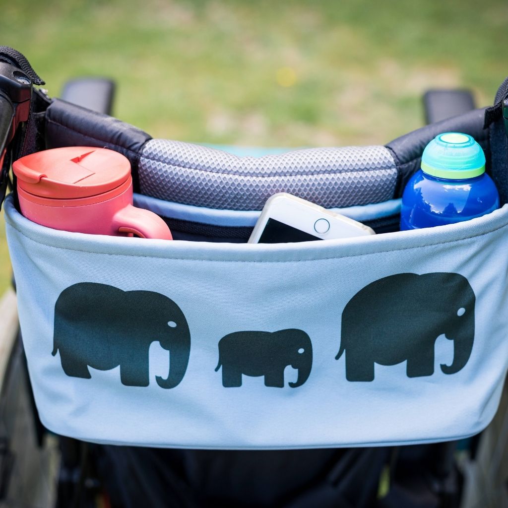 These handy wheelchair organiser bags fit on all wheelchairs, powerchairs, special needs buggies and rollators. Seen here in an elephant design.