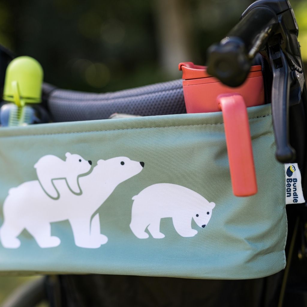 These handy wheelchair organiser bags fit on all wheelchairs, powerchairs, special needs buggies and rollators. Seen here in a polar bear design.