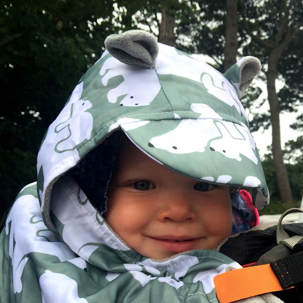 BundleBean Babywearing fleece-lined and waterproof cover with hood in polar bear design
