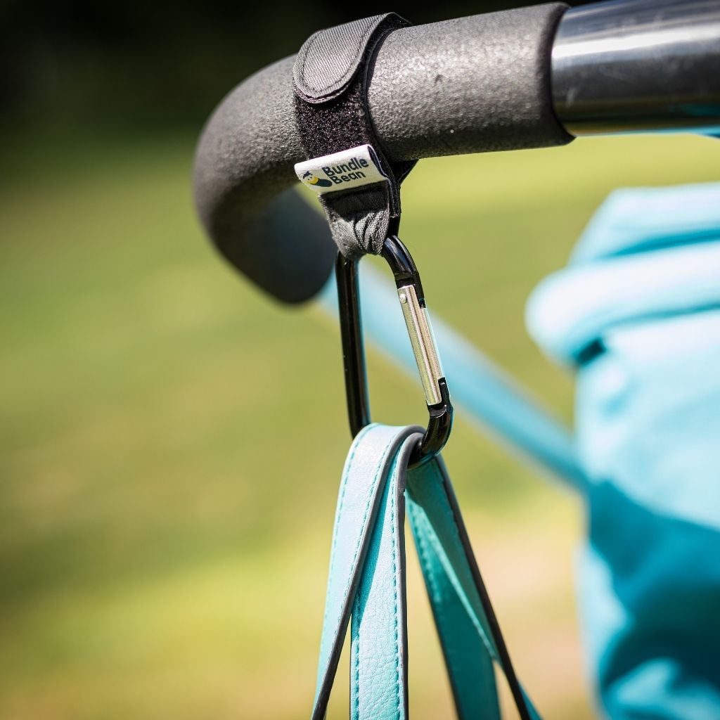 Super-strong aluminium hooks which can be attached to pushchairs or wheelchair handles and hold up to 5kg of shopping or other essentials