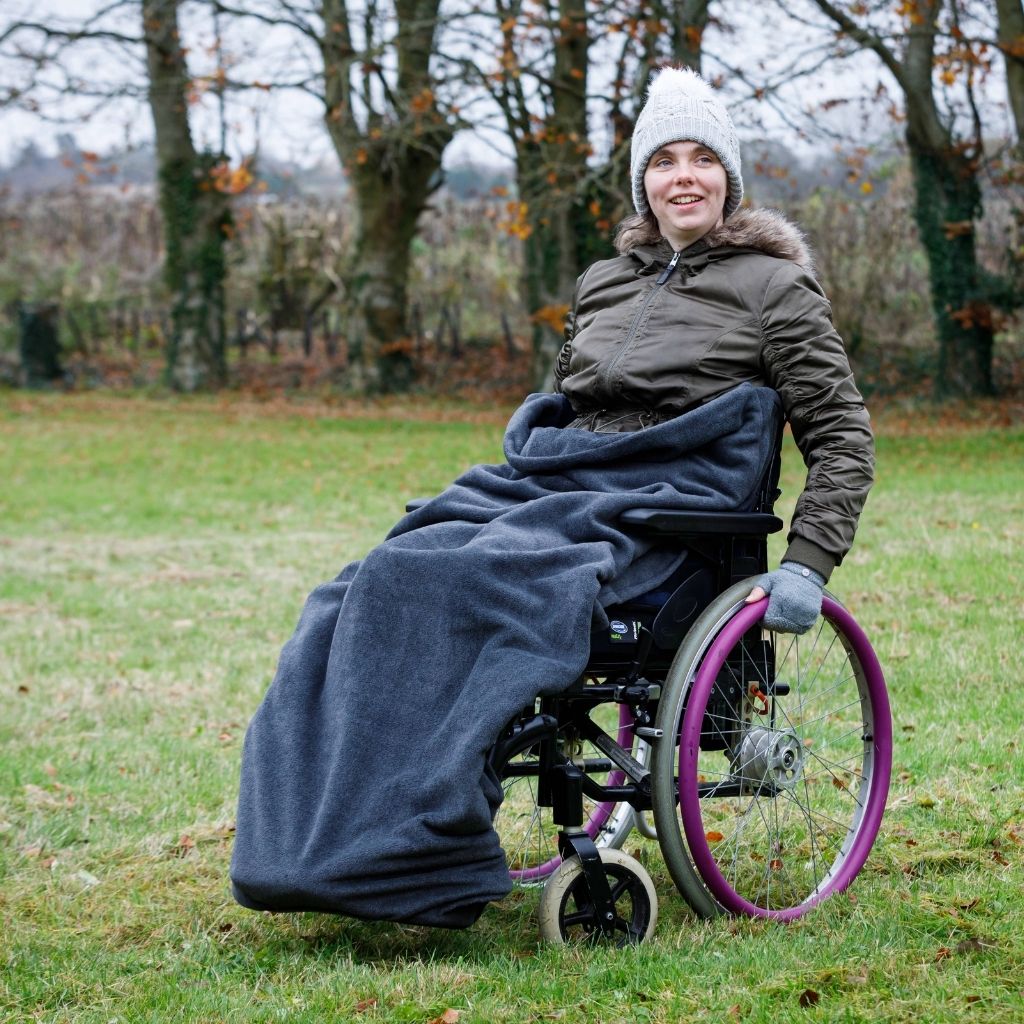 Our BundleBean Extreme double-layer fleece wheelchair blanket which can be attached to a liner.  Seen here in black.