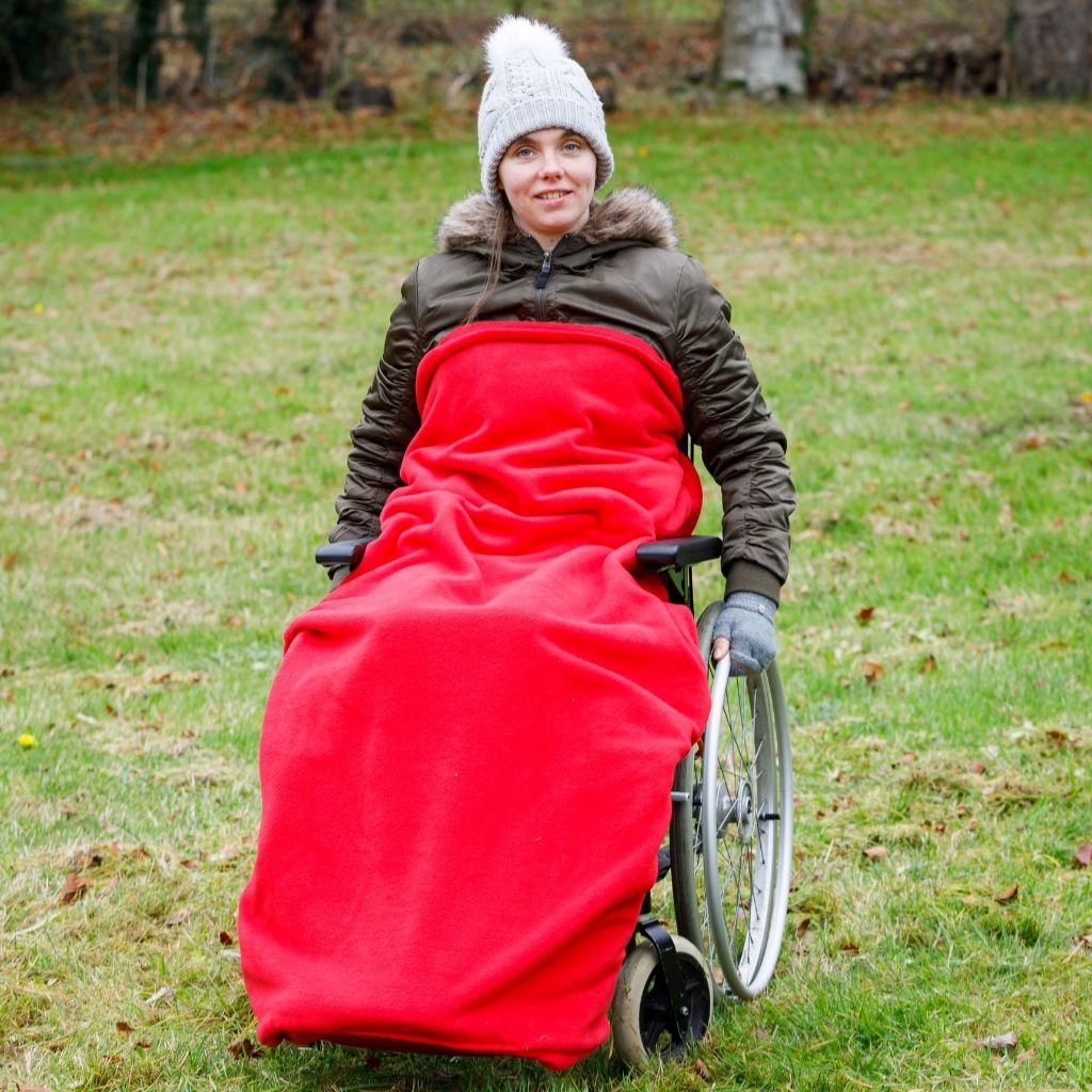 Our BundleBean Extreme double-layer fleece wheelchair blanket which can be attached to a liner. Seen here in red.