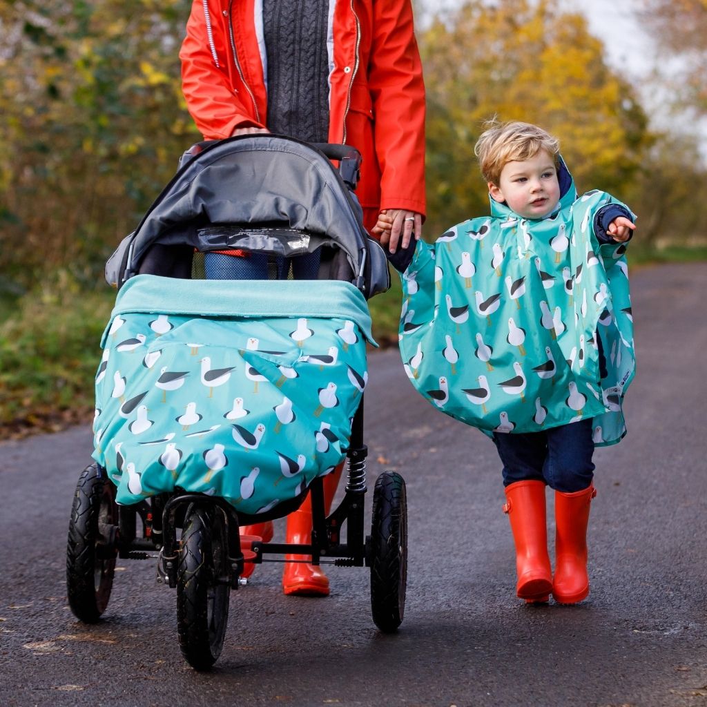 The GO is a great alternative to a traditional footmuff - versatille and waterproof. Can be used on buggies, car seats, bike seats or carriers for smaller babies. Seen here wtih our matcing toddler poncho