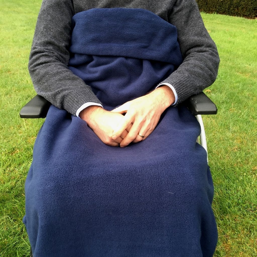 Our BundleBean Extreme double-layer fleece wheelchair blanket which can be attached to a liner. Seen here in navy.