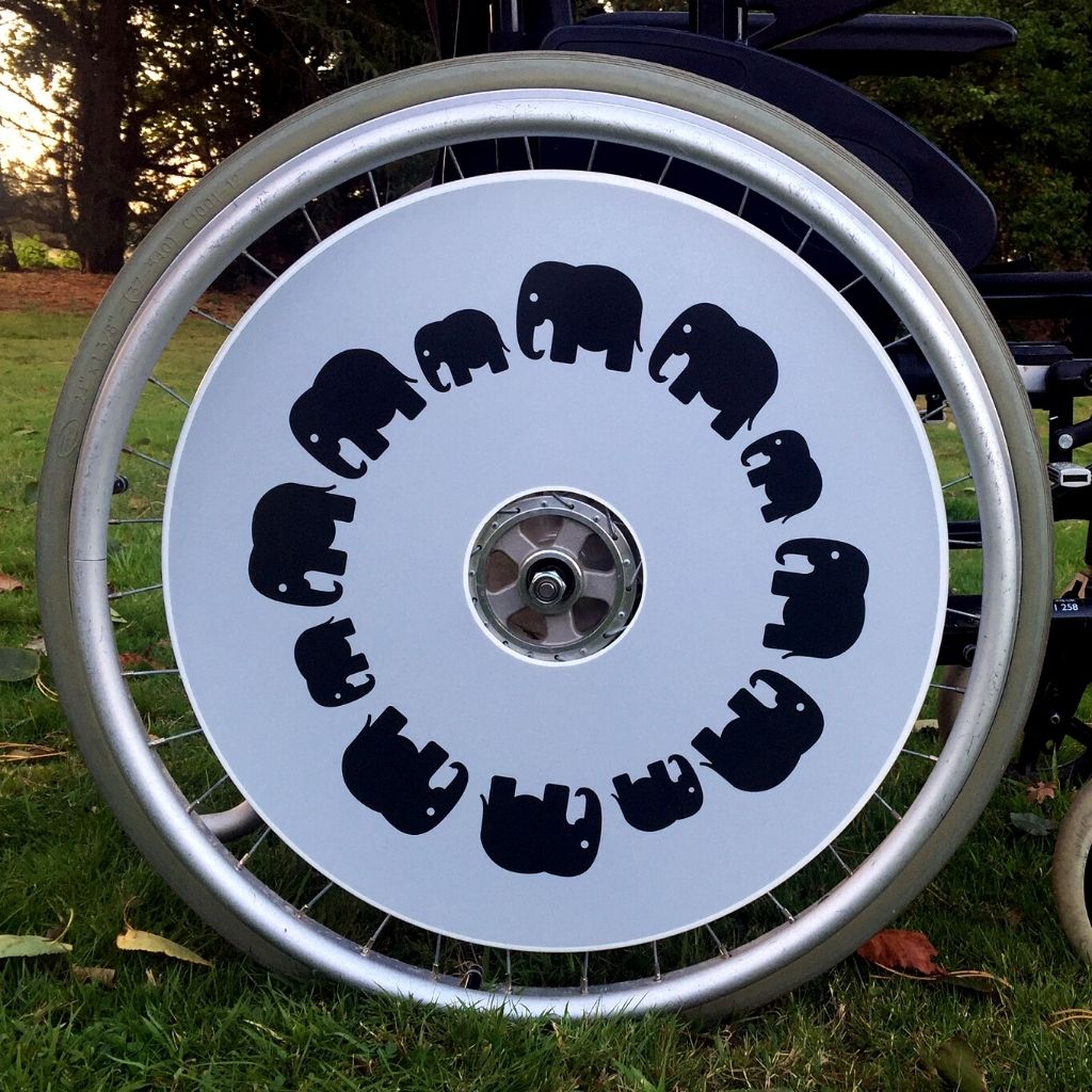 Wheelchair spokeguard custom made to order in an elephant design. Match with your wheelchair cosy.