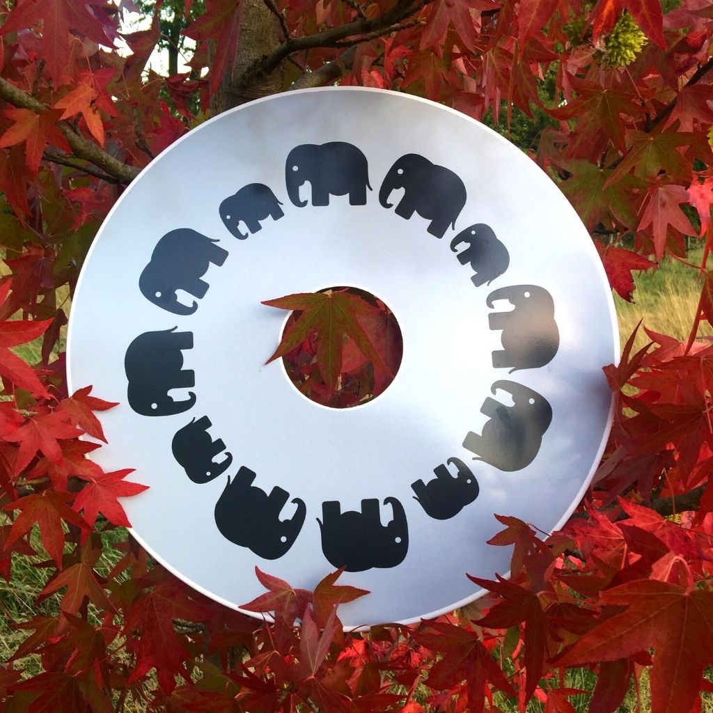 Wheelchair spokeguard custom made to order in an elephant design. Match with your wheelchair cosy.