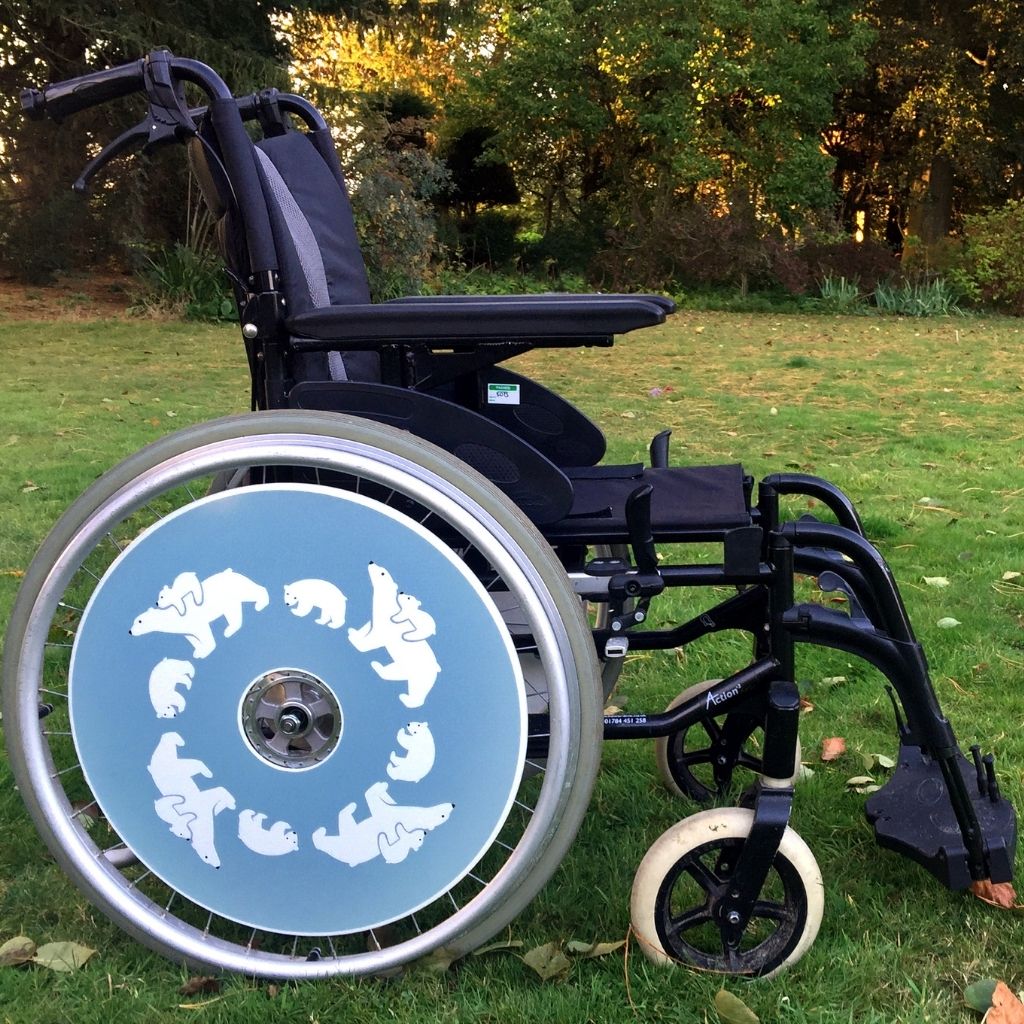 Wheelchair spokeguard custom made to order in a polar bear design. Match with your wheelchair cosy.