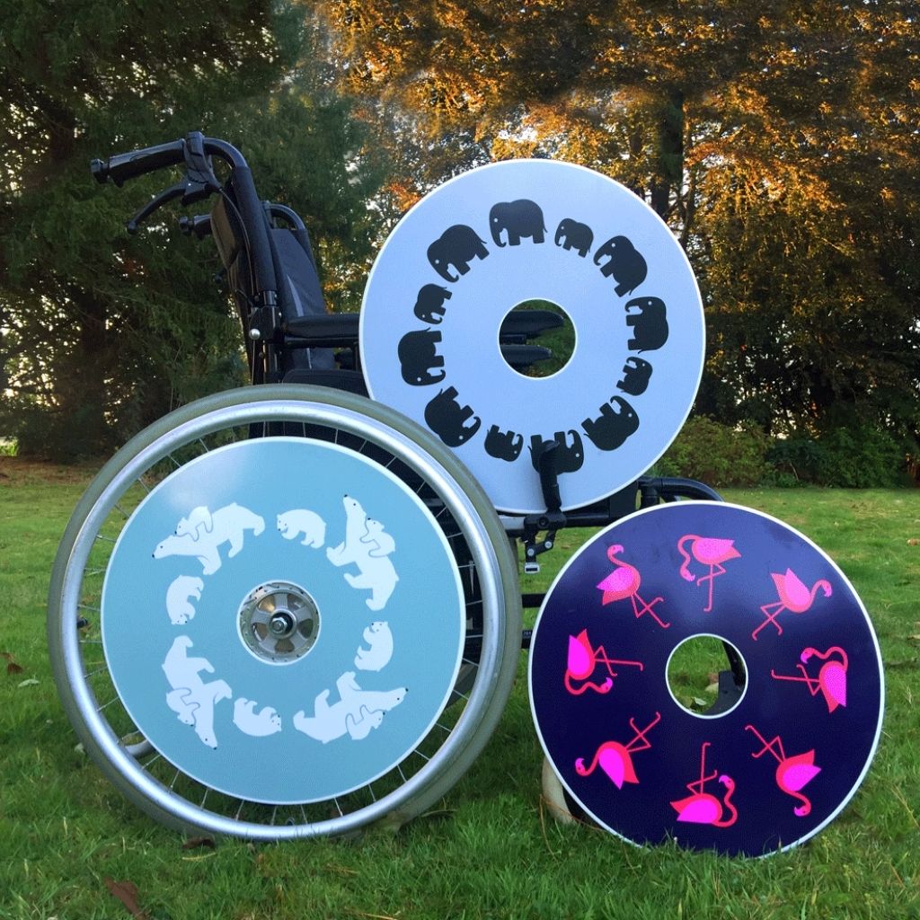 Wheelchair spokeguard custom made to order. Match with your wheelchair cosy. Seen here in a polar bear, elephant and pink flamingo design.