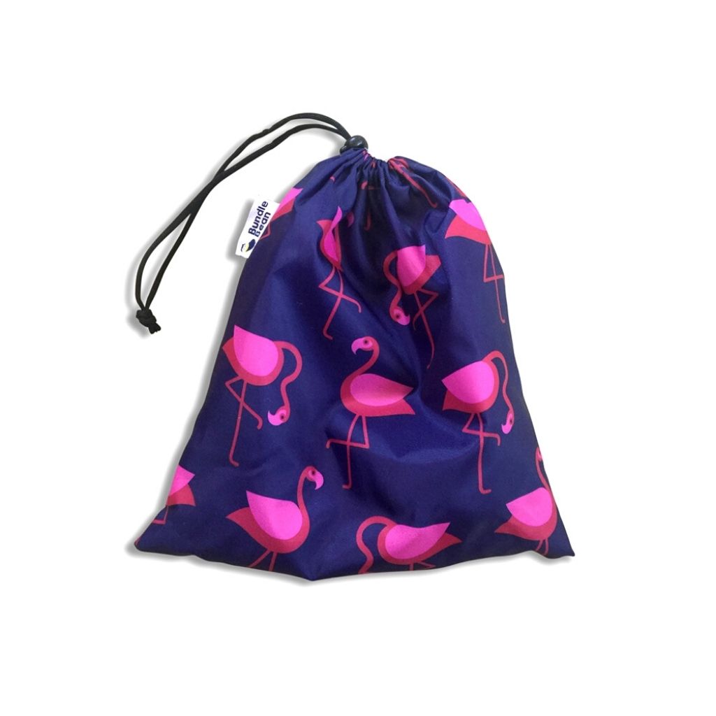 Spare stuff sac to store waterproof covers in a pink flamingo design