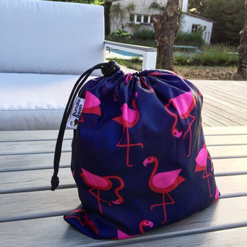 Spare stuff sac to store waterproof covers in a pink flamingo design
