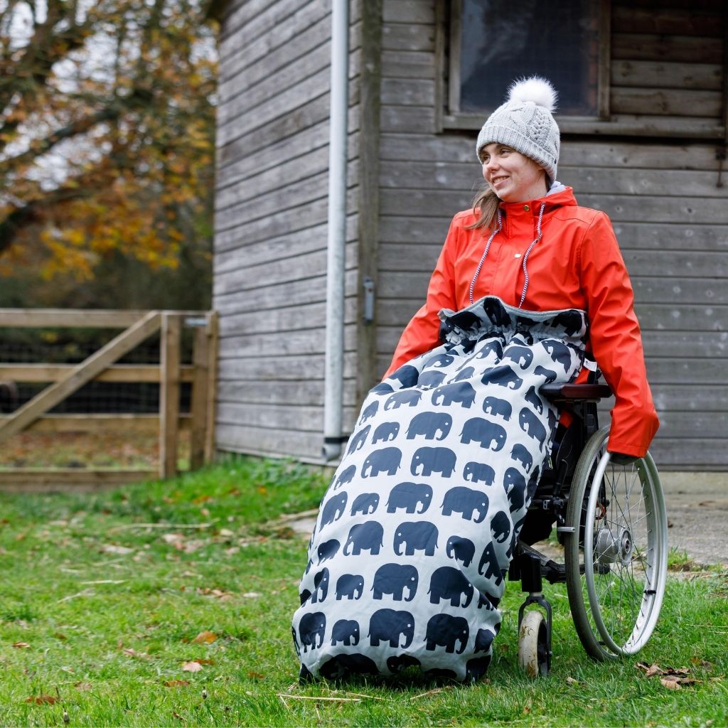 BundleBean Adult fleece-lined and waterproof wheelchair cosy in elephant design fits easily on to your wheelchair