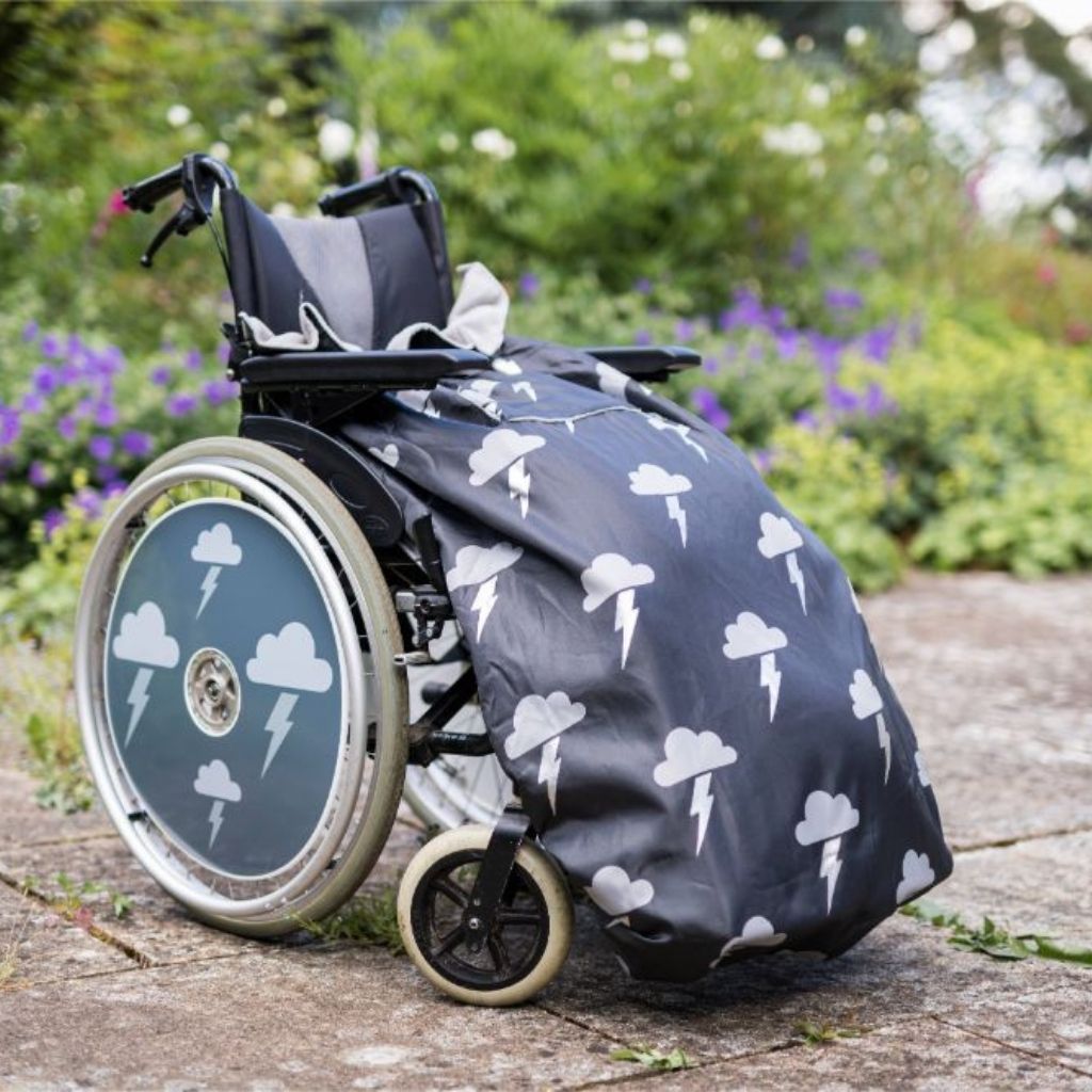 BundleBean Adult fleece-lined and waterproof wheelchair cosy in silver lightning design fits easily on to your wheelchair.
