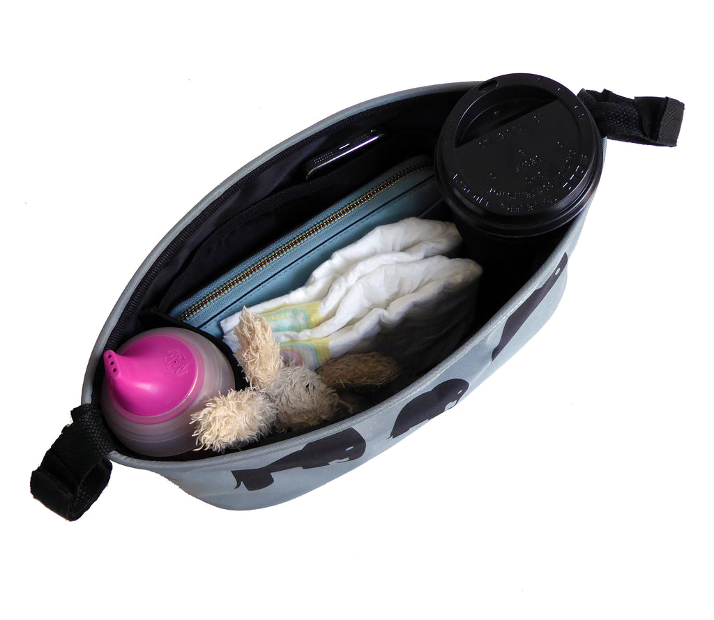 These handy buggy organiser bags fit to your handlebars – perfect for everyday essentials! Seen here in elephant design.