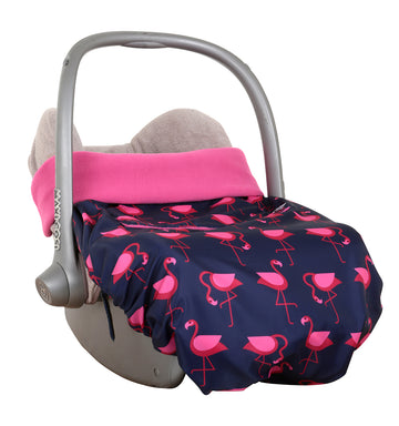 The BundleBean GO is a waterproof footmuff for babies and toddlers that fits snugly on to buggies, bike seats, car seats and baby carriers. Seen here on a car seat and in a flamingo design.