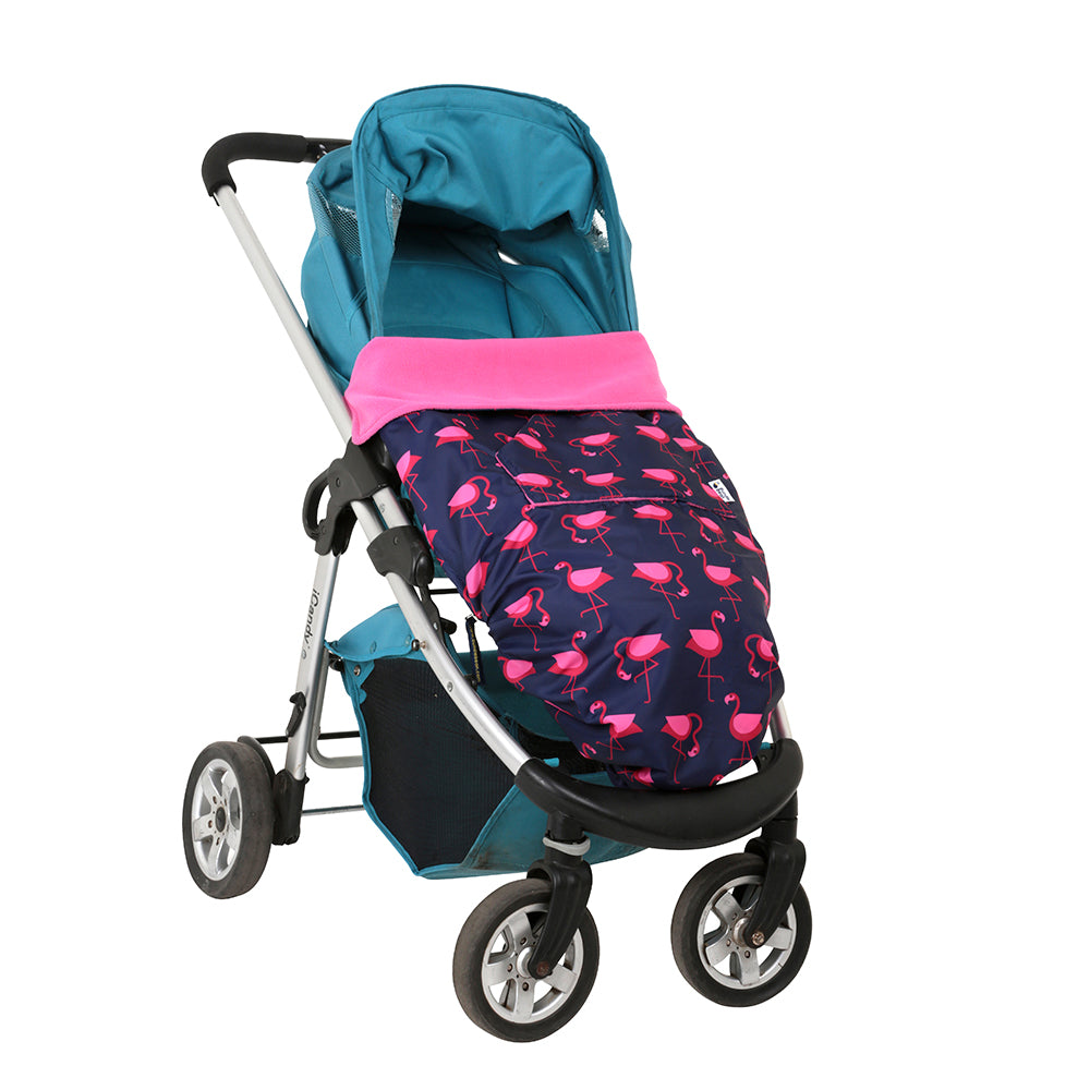 The BundleBean GO is a waterproof footmuff for babies and toddlers that fits snugly on to buggies, bike seats, car seats and baby carriers. Seen here on a pram and in a flamingo design.