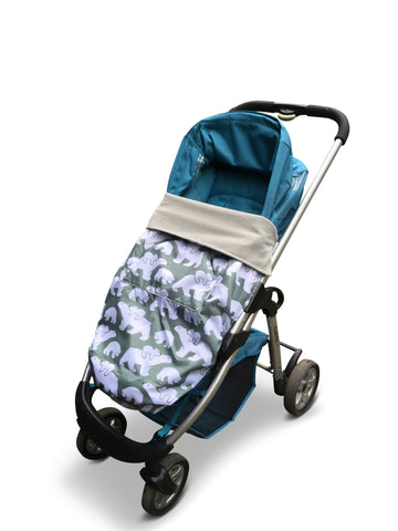 The BundleBean GO is a waterproof footmuff for babies and toddlers that fits snugly on to buggies, bike seats, car seats and baby carriers. Seen here on a pushchair and in a polar bear design.