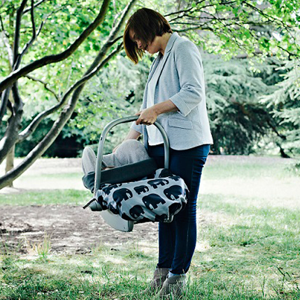 The BundleBean GO is a waterproof footmuff for babies and toddlers that fits snugly on to buggies, bike seats, car seats and baby carriers. Seen here on a car seat and in an elephant design