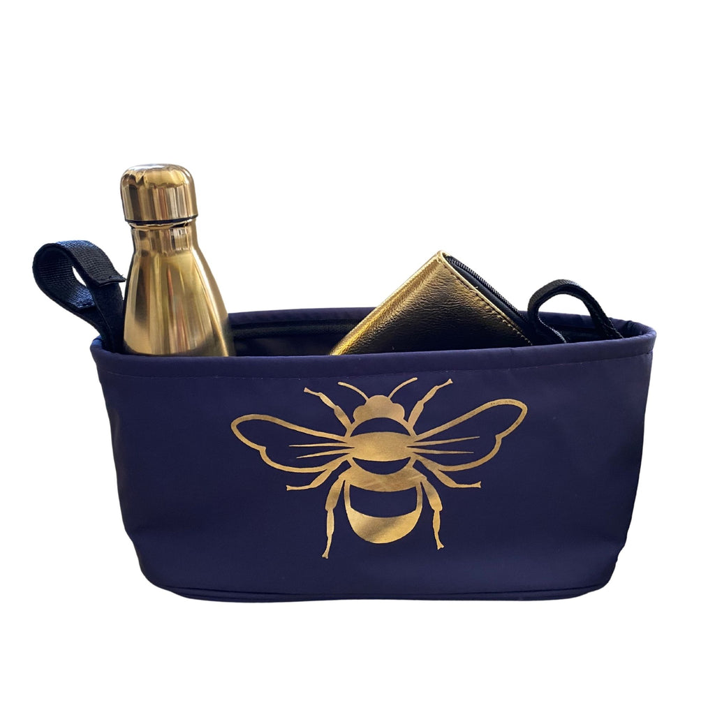 These handy wheelchair organiser bags fit on all wheelchairs, powerchairs, special needs buggies and rollators.  Seen here in a gold bee design.