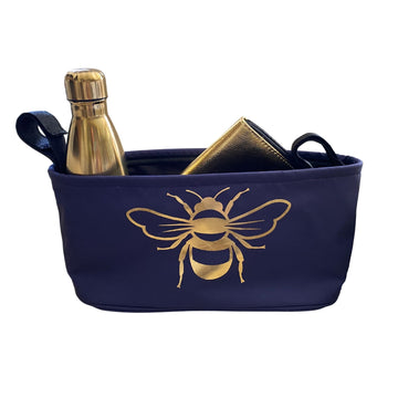 These handy buggy organiser bags fit to your handlebars – perfect for everyday essentials! Seen here in gold bee design.