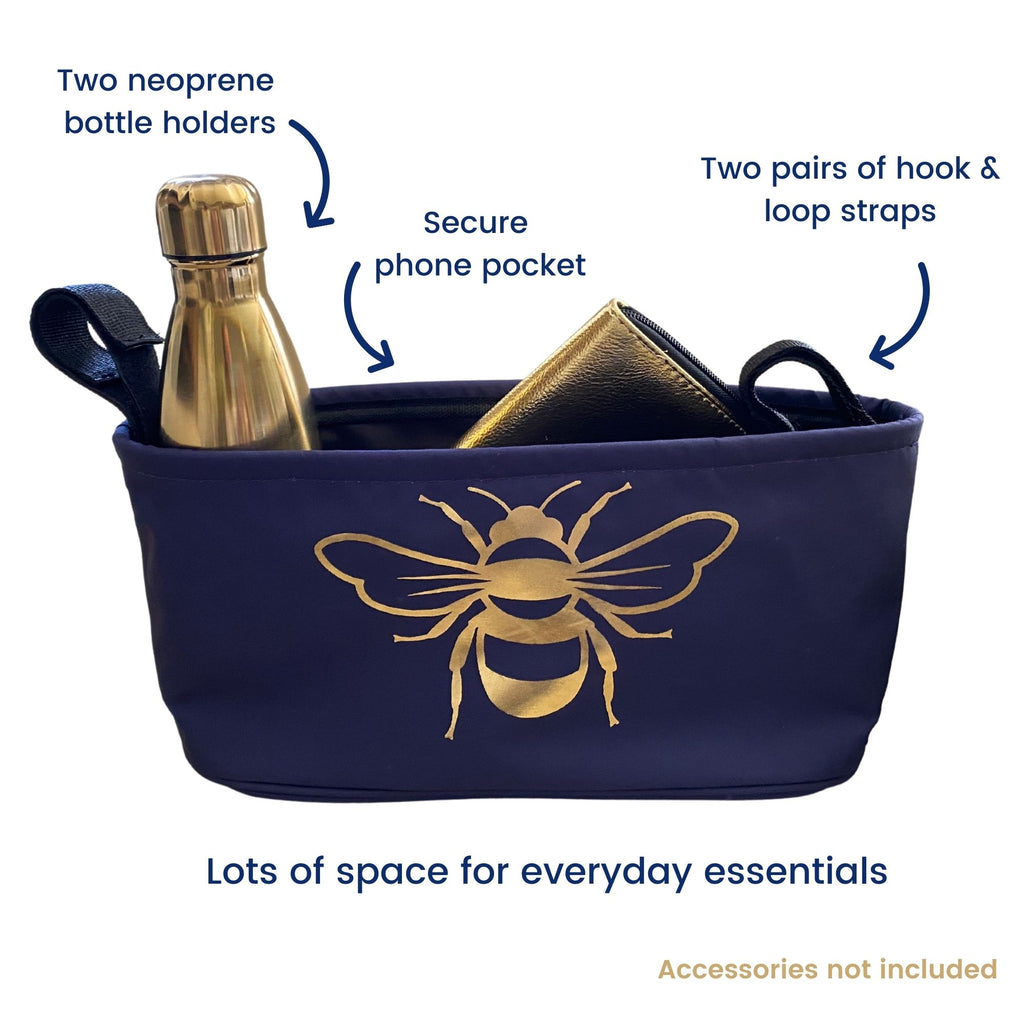 These handy buggy organiser bags fit to your handlebars - complete with two neoprene bottle holders, a secure phone pocket and two pairs of hook & loop straps. Seen here in gold bee design.